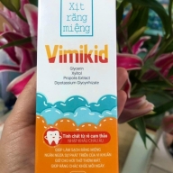Xịt răng miệng phòng và hỗ trợ hạn chế sâu răng Vimikid lọ*30ml